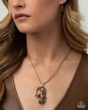 Load image into Gallery viewer, Ferocious Feline ~ Gold Necklace ~ Paparazzi ~ Life of the Party March 2026
