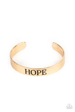 Load image into Gallery viewer, Hope Makes The World Go Round Gold Cuff
